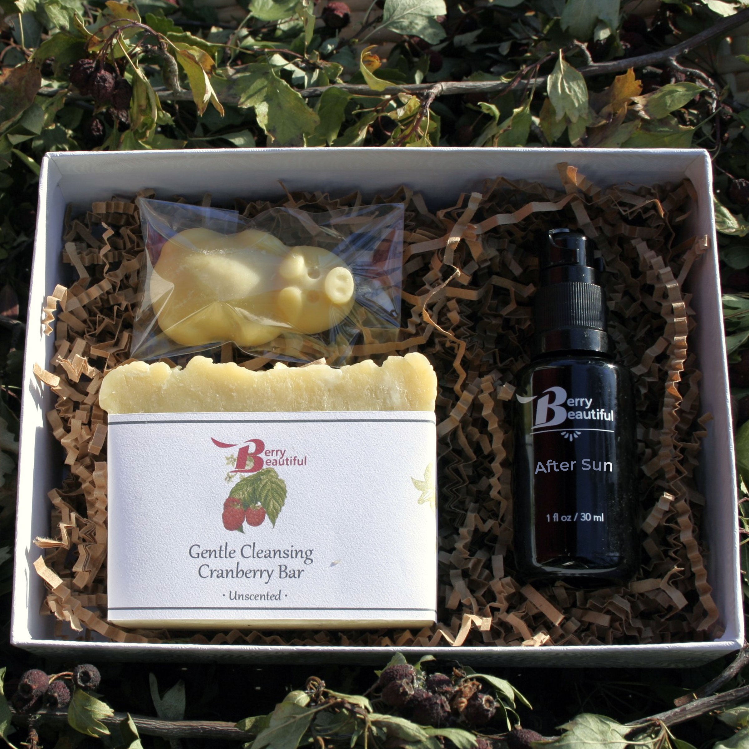 Berry Beautiful Aftersun Gift Box set featuring natural skincare products crafted with cold-pressed raspberry seed oil and soothing botanicals, perfect for sun-exposed skin.